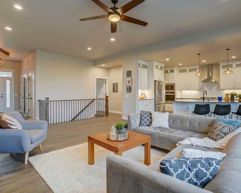 Interior of a custom home with open style kitchen and living room