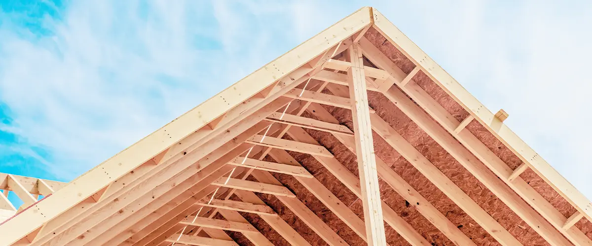 Newly built wooden truss roof with open framework