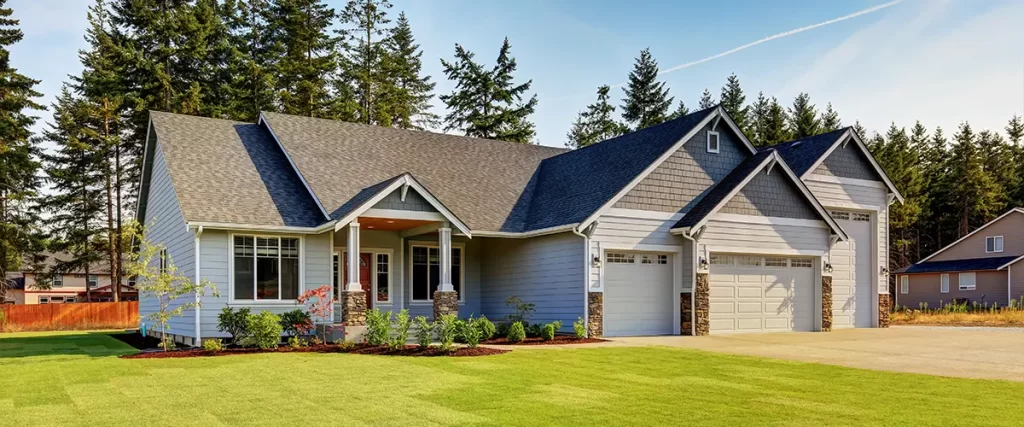 Finished custom home with a large lawn and three-car garage